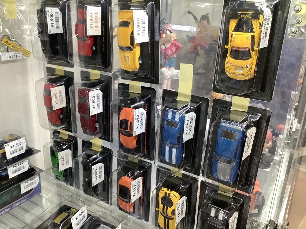 Miniature cars and car logo keychains