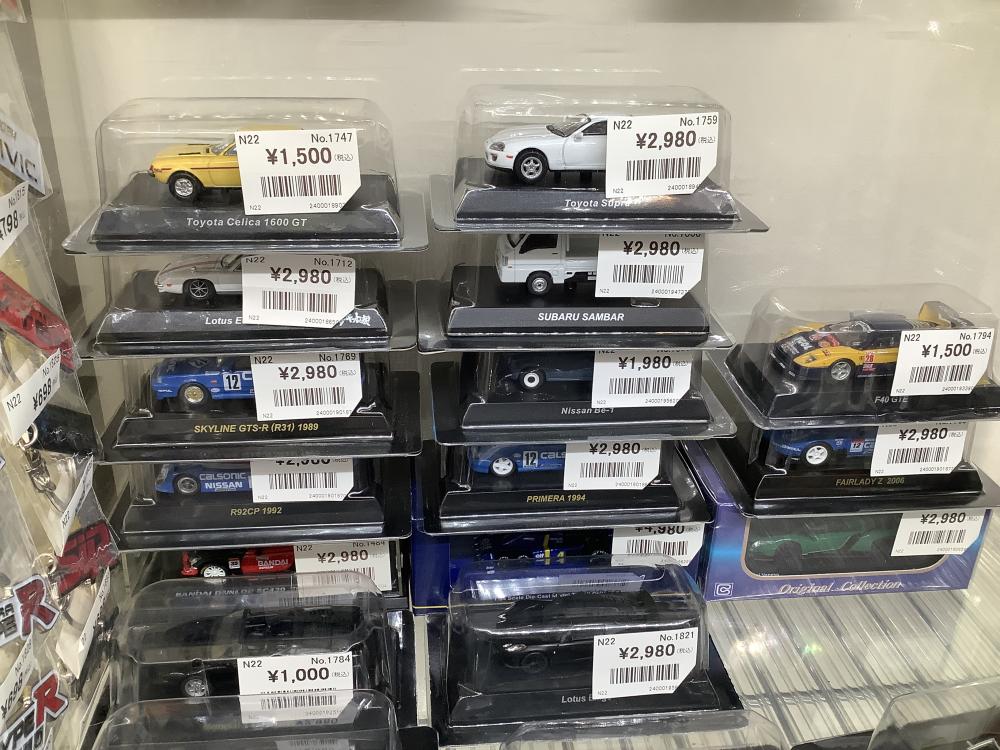 Miniature cars and car logo keychains